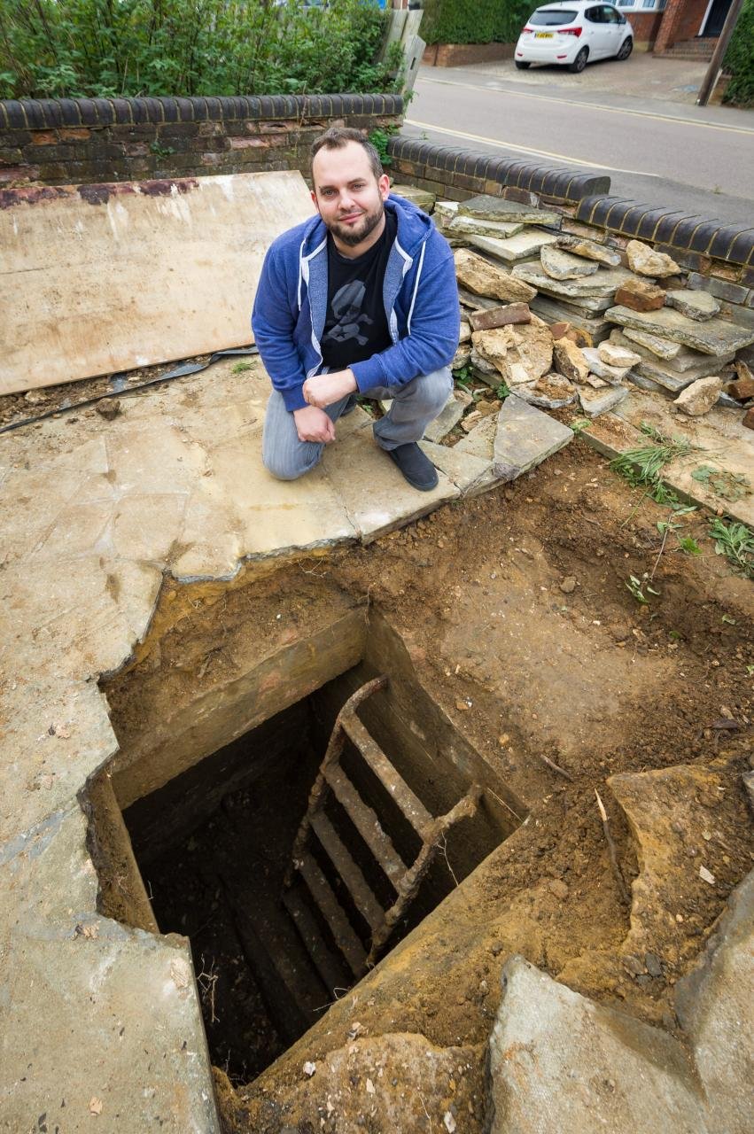  Simon Marks with the entrance to the air raid shelter in his driveway